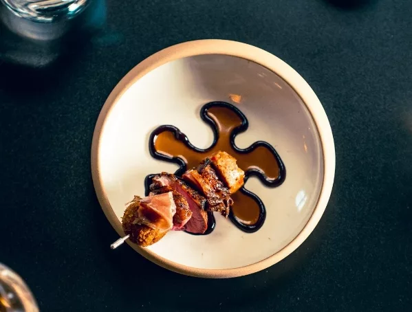 Confit duck skewer at Portfolio